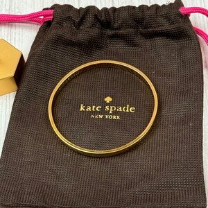 Kate Spade Gold Tone Bangle Engraved with “heart of gold”